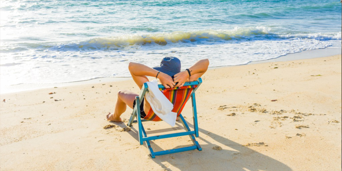 An image of a guy enjoying a day out at the beach