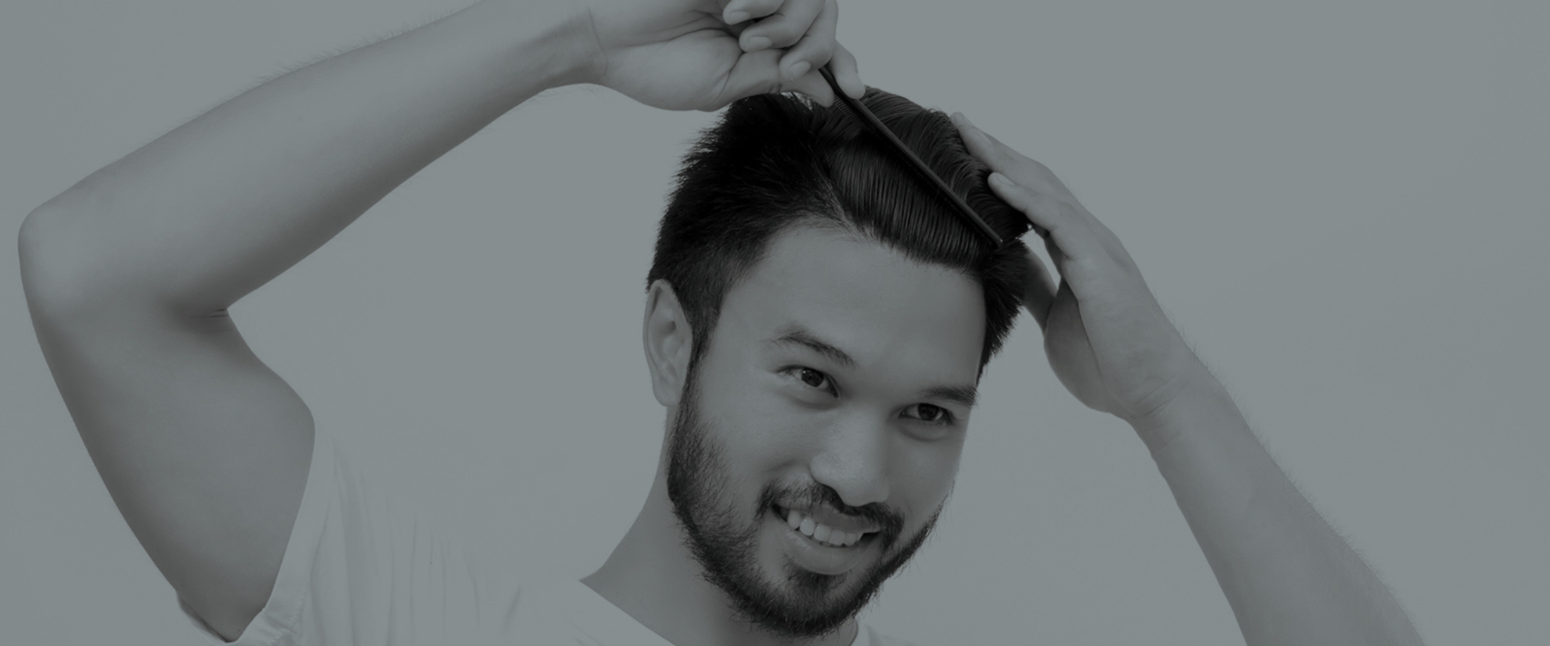 Clinique De Paris - Filipino Asian man brushing hair after hair transplant